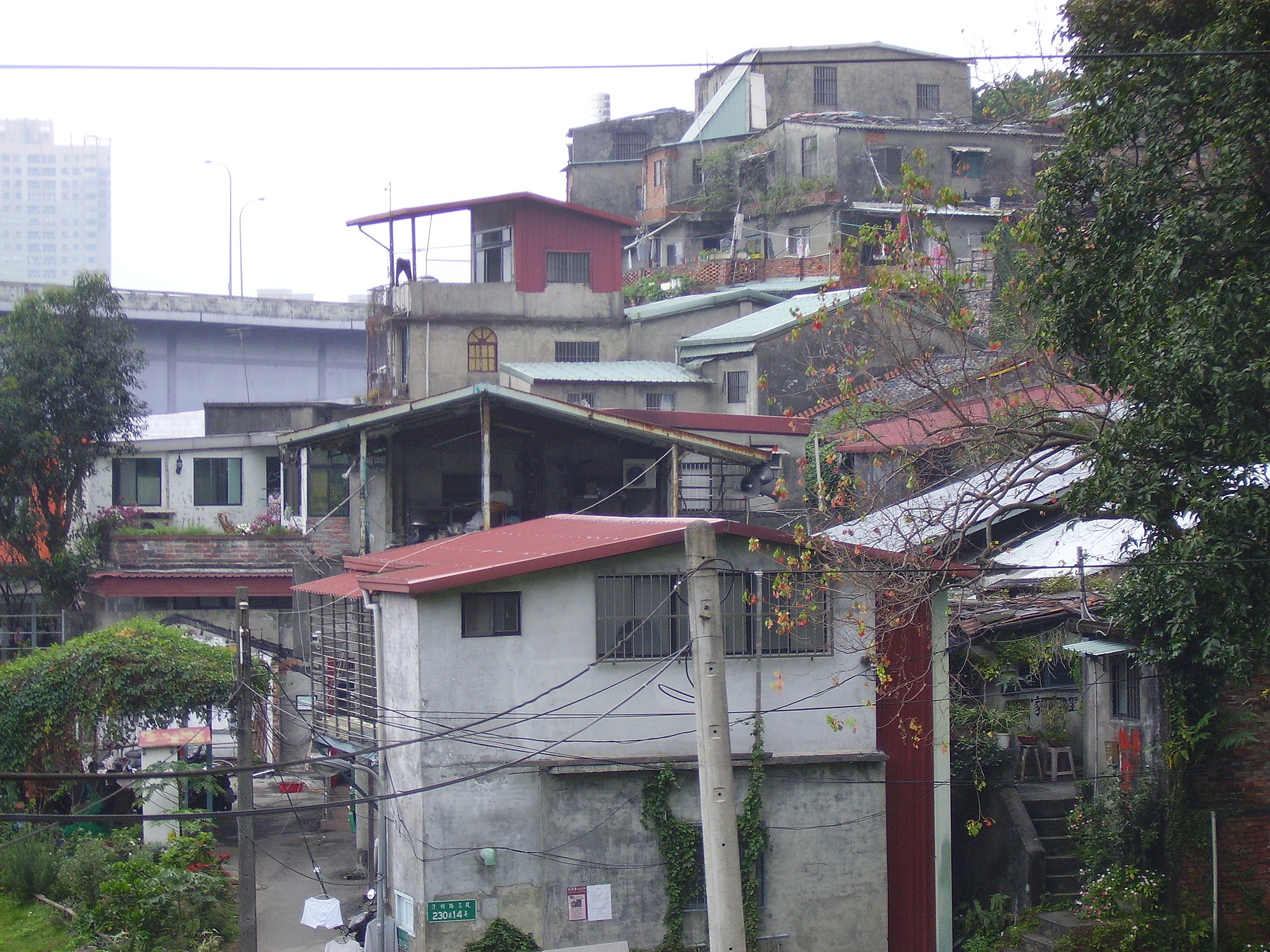 settlements to accommodate displaced military personnel or civil servants and their families who relocated to Taiwan with Kuomintang after the Chinese Civil War